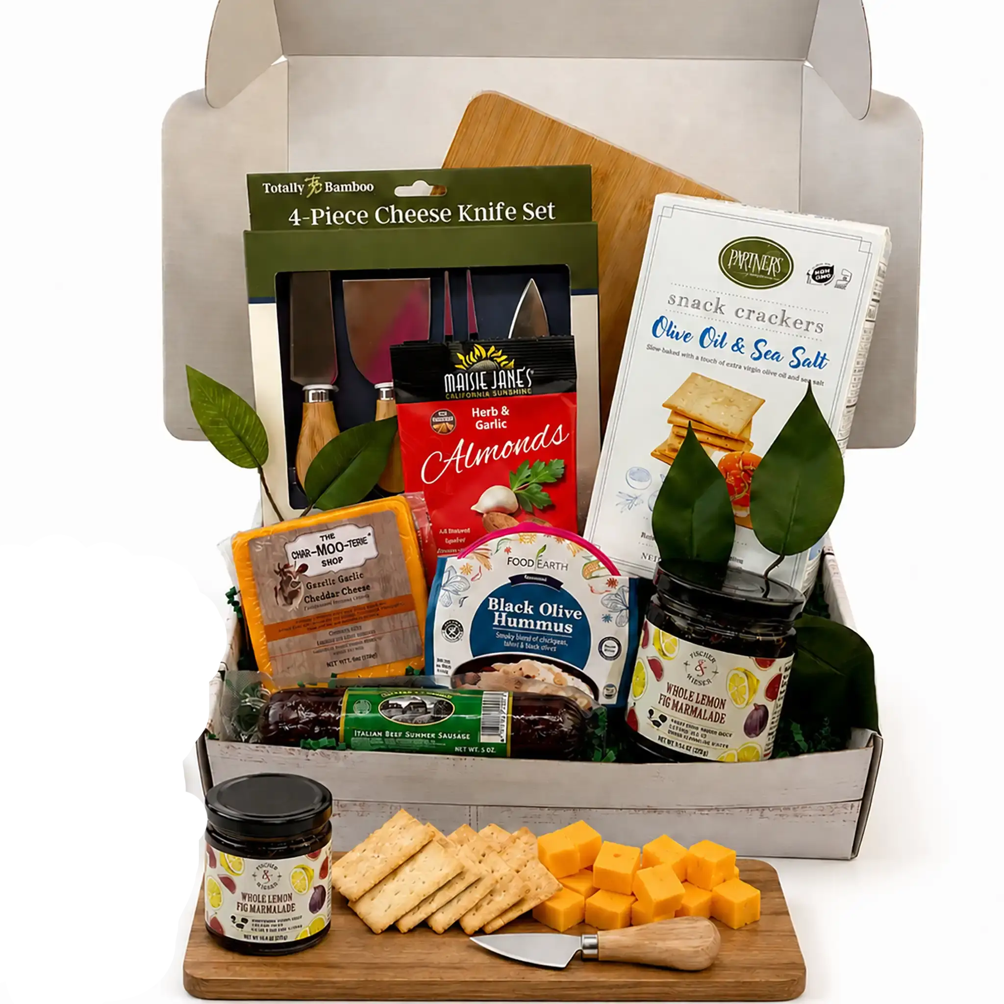 Charcuterie gourmet gift basket with a bamboo board, cheese knives, meats, cheeses, and crackers